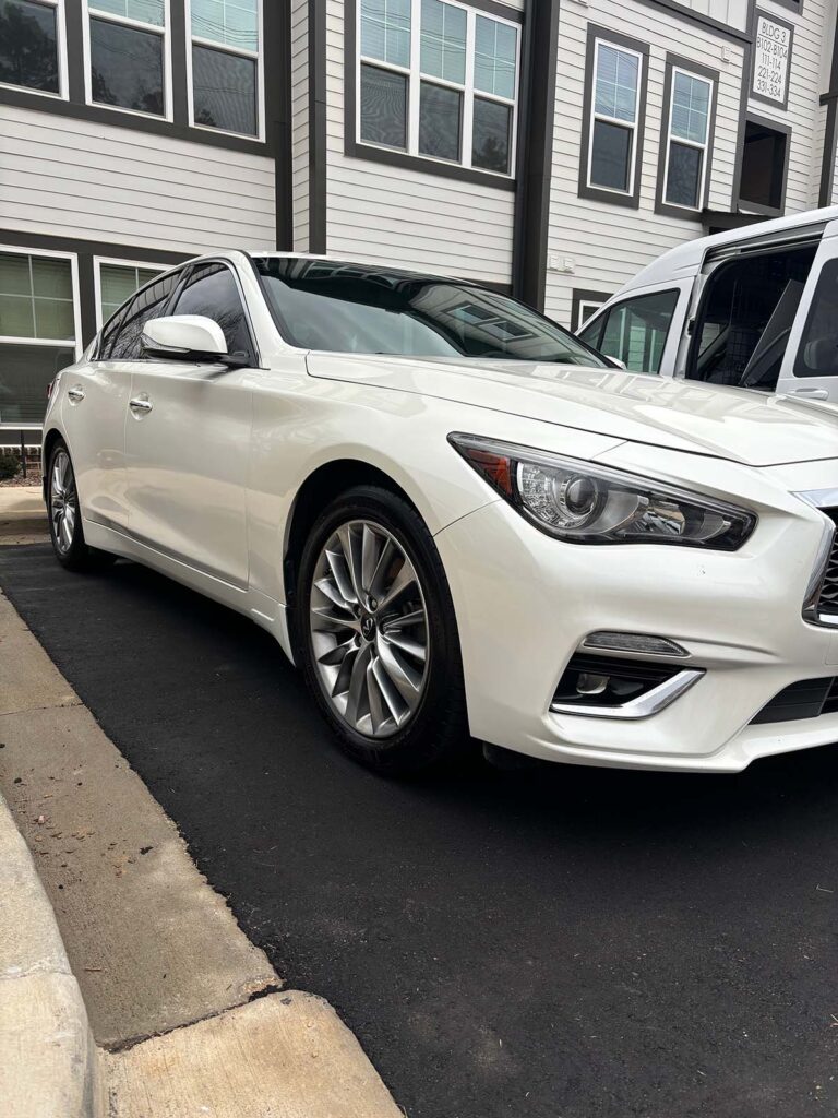 An exterior detail on a Pineville customer's car outside their apartment building.