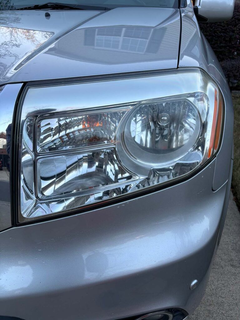 A headlight restoration job by Charlotte's Mobile Detailing.