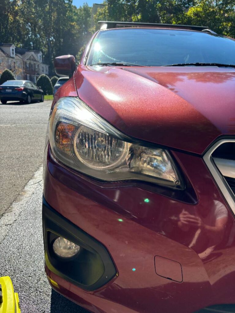 Angle 2 of a recent headlight restoration job on a Subaru by Charlotte's Mobile Detailing.